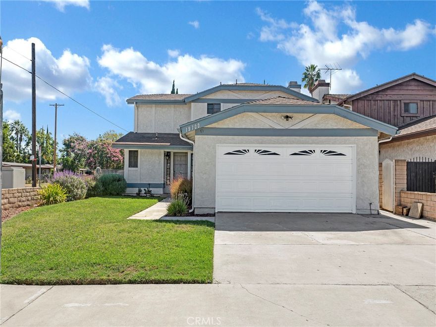 Welcome to this bright and spacious 4-bedroom, 3-bath home on a corner lot in the heart of Winnetka! Recently updated with fresh paint and newer floors, this super clean home offers comfort and versatility with central heat and air, a cozy fireplace in the living room, and a bonus den/sunroom perfect for a playroom, office, or lounge. The layout includes one bedroom and half bath downstairs, while upstairs features the primary suite with ensuite bath and walk-in closet plus two additional bedrooms and a full bath. Additional highlights include a two-car garage with laundry area, driveway parking for two more cars, and a private, spacious backyard ideal for relaxing or entertaining. Enjoy the convenience of being just minutes from Pierce College, Westfield Topanga Mall, The Village, local restaurants, shops, and easy freeway access. Ready to move in—this is a wonderful home in a fantastic location!