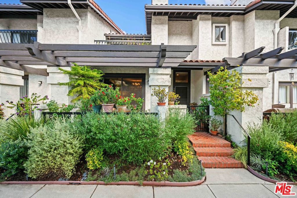 Beautiful, Spacious, Private Retreat in the Palisades Highlands! Discover the perfect blend of comfort, space, and serenity in this beautifully maintained townhome, nestled in the peaceful Palisades Highlands. Offering 2 bedrooms, 3 bathrooms, a den/family room, and a separate office across 2,126 sq ft, this home is designed for versatile living. The light-filled main level welcomes you with soaring vaulted ceilings, a cozy fireplace, and an inviting open layout that flows effortlessly to a lush, private patioideal for seamless indoor-outdoor living. Up a short flight of stairs, you'll find a formal dining room, built-in bar, and a chef's kitchen equipped with stainless steel appliances. A spacious office and powder room complete this level, offering a perfect work-from-home setup. Retreat to the top level where the expansive primary suite offers a peaceful escape with its its fireplace, private balcony, walk-in closet, and spa-like en-suite bathroom featuring a soaking tub, dual vanities, and a separate shower. A generously sized guest bedroom sits across the hall for privacy, complete with its en-suite bath. Residents enjoy access to resort-style amenities, including a pool, spa, fitness center, and ample guest parking. Available, furnished or unfurnished, this home is an exceptional opportunity in a highly sought-after community. Don't miss your chance to live in one of the Palisades' most desirable enclaves!