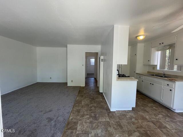 This cute 2 bedroom, 1 bathroom duplex has just been updated with brand new carpet and fresh paint throughout. Enjoy the convenience of in-home laundry hookups and a gated front and side yard. The property includes a shared driveway and shared 2-car garage space. Rent covers water, trash and gardening service so you can enjoy low-maintenance living. Conveniently located near Highways 33 and 101, you'll have quick access to shopping and dining.