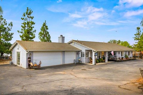 Photo of 15110 Ayers Lane Ln, Valley Center, CA 92082 (MLS # 250039698SD)