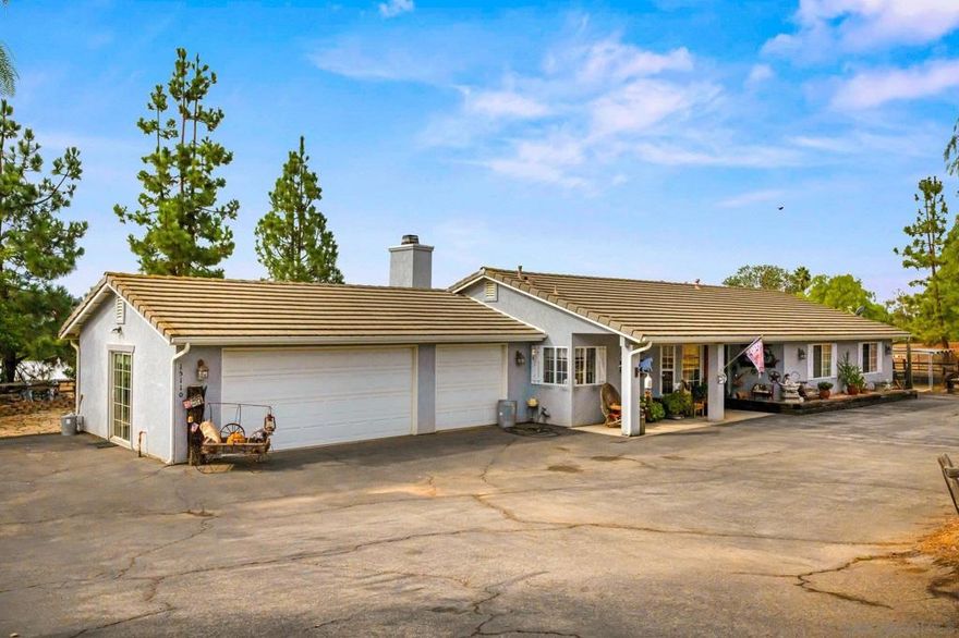 Escape to your own western retreat tucked in the rolling hills northwest of Escondido in North County San Diego. This one-of-a-kind property is thoughtfully designed to bring all your country dreams to life, with horse facilities, a massive 1,728 sq. ft. shop, and a custom, one-owner home filled with features you have to experience in person. Unwind in style after a long day on the ranch and step into the finished garage that’s been transformed into the ultimate game room, or soak under the stars in your private 4-person spa. The property is fully fenced with durable vinyl-coated chain link and offers multiple gated entrances for easy access. A large covered RV parking area keeps your coach shaded, while the shop goes above and beyond with a fully functional animal grooming room. Whether you’re looking for a horse-friendly setup, space for hobbies and projects, or simply a peaceful country lifestyle close to the city, this property delivers it all.
