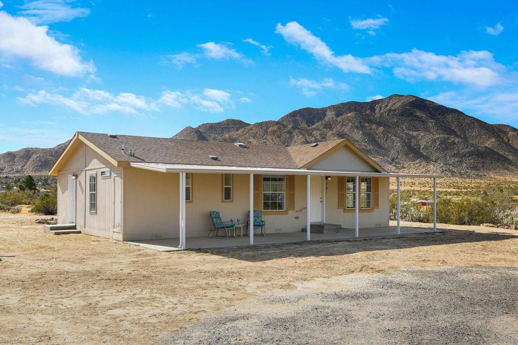 Nestled in Shelter Valley, this property boasts a charming 2-bedroom, 2-bath home spanning 1173 sq ft., on five acres. The dwelling offers breathtaking panoramic views of the surrounding mountains, including the picturesque ranges of Granite, Laguna, and Volcan Mountain. Shelter Valley, situated in a high desert area, experiences delightful seasonal weather, making it an ideal winter getaway location. Nearby attractions such as Lake Cuyamaca, Ocotillo Wells State Park, Aqua Caliente County Park, and Anza Borrego State Park provide ample opportunities for outdoor adventures. The property also offers proximity to Three Sisters Falls and Volcan Mountain Preserve, perfect for nature enthusiasts. The quaint Julian Townsite adds charm with its events, restaurants, and the distinction of being an International Dark Sky Community, enhancing the stargazing experience. Come and experience a lifestyle worth living in a community where we call home. APN 2511900500 and a two-and-a-half-acre parcel are included with the sale. Property is being sold with 721 Wells Fargo Trail (APN 2511900500).