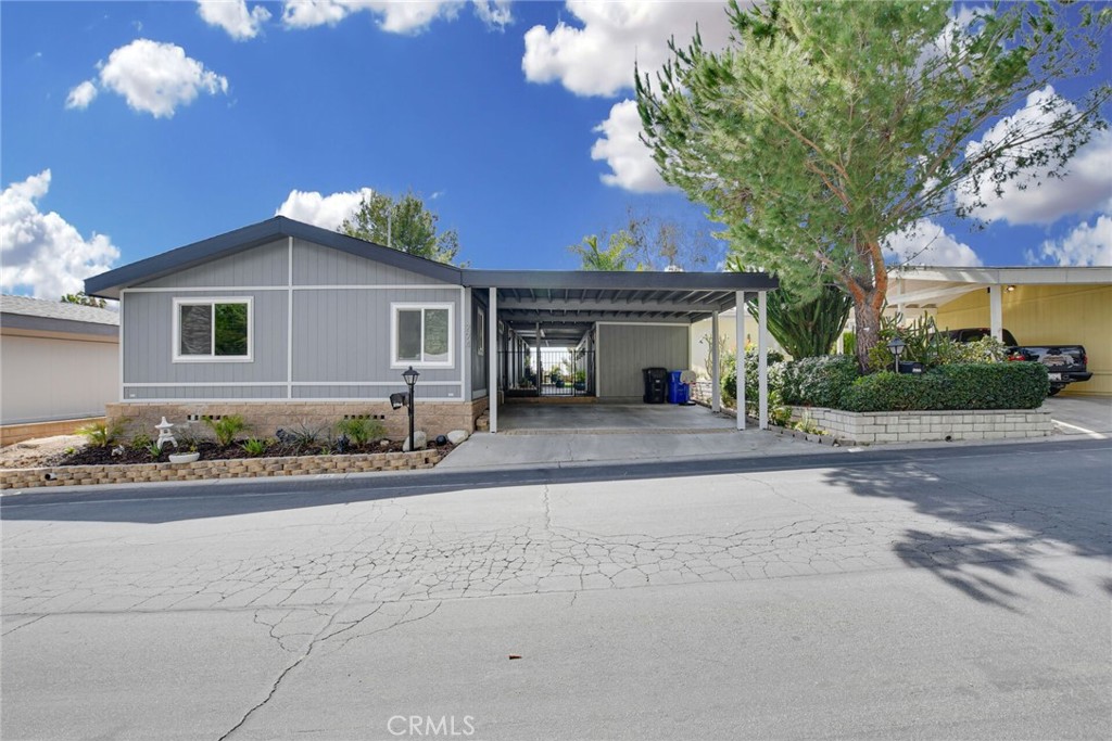 Gorgeous 2 bedroom, 2 bath home situated in the 55+ Community of Mountain Shadow. In absolute turnkey condition, tastefully upgraded. Walk right into a spacious living room/dining room where you can entertain your guests while enjoying the breathtaking panoramic views. Upgraded kitchen with white quartz counters, upgraded cabinets ( lazy Susans), recessed lighting, stainless steel appliances (approximately 2 years old), tile flooring, breakfast counter. Spacious main suite with tile floors, walk-in closet and own bathroom, which has been upgraded with tile flooring, new vanity (with quartz counter tops), sunken bath tub and separate shower with glass door. You guests will enjoy their own privacy with a guest room and gorgeous, upgraded full bathroom located directly across from the bedroom. Other amenities are a large concrete, covered back patio with views, great for BBQ parties or get togethers. Side covered, concrete patio overseeing a small yard. Separate laundry room, ceiling fans, and car port. The community offers a lot of perks. They have a clubhouse, hobby house, thrift store, sparkling pool, spa, gym, and BBQ area. This is a must see and wont’ last long.