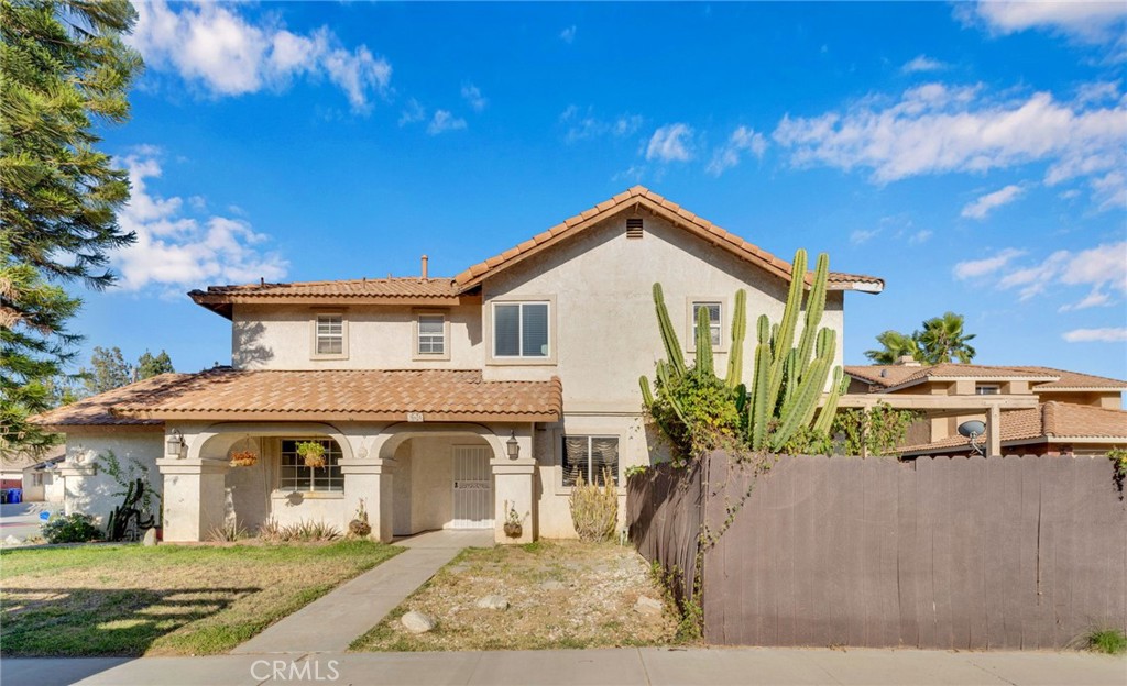 Why settle for a condo when you can buy a home! This home is priced to sell! Calling all buyers! Located in the highly desirable and historic City of Rialto, this 3-bedroom, 2.5-bath corner property is perfect for first-time buyers, someone looking to downsize or as an investment property. It’s a blank canvas ready for your personal touch, offering move-in readiness with the ability to update at your own pace. Enjoy added value with solar panels for energy savings, a Vivint security system for peace of mind, a newer water heater and stove, plus lots of natural light throughout. The living room features a cozy fireplace: perfect for crisp fall evenings. The kitchen includes a breakfast bar, dining area, and a convenient downstairs half bath for guests. Upstairs, you’ll find a full bath with space for dual sinks or a vanity, and generously sized bedrooms. The primary suite features high ceilings, a large walk-in closet, and an en-suite bathroom with a walk-in shower. Other highlights include laundry in the garage, storage under the stairs, and a covered backyard patio with room for a garden. There are fruit trees and a space for kids or critters to run and play. Enjoy dining alfresco under your covered patio with beautiful views of the mountains. Don’t miss out on this great opportunity!! Schedule your private tour today and see the possibilities for yourself! Click on the virtual tour link for a closer look.