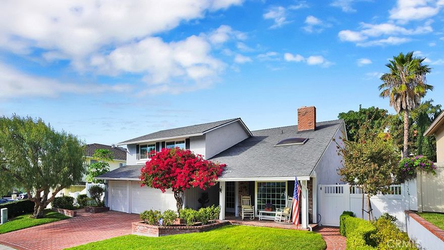 Ensconced within the extremely desirable Aegean Hills neighborhood of Mission Viejo, this well maintained pool home promises the quintessential Southern California lifestyle. Boasting four generously sized bedrooms, a large bonus room (currently used as a fifth bedroom), three bathrooms, 3,253 square feet of living space on a tastefully landscaped 8,162 square foot lot, the home’s quiet location and scale will easily accommodate large gatherings of your loved ones and friends. Upon arrival a picturesque scene greats you featuring a brick driveway, manicured lawn and east facing covered front porch accented by the home's white exterior trim and red bougainvillea. The covered porch is an ideal place to enjoy the last rays of sunshine. Enter the home through oversized double doors to a grand vaulted ceiling, a skylight the allows natural light to illuminate freshly painted walls, engineered wood floors, new carpet and a pass through fireplace that connects the living room with dining room. There are two seating areas in the backyard located just outside the dining room's sliding glass door. There is space to seat six beneath the existing sunshade and additional seating for four beneath the hardtop gazebo near the outdoor fire pit as well as a grassy side yard with vinyl fence leading back to the front yard. The open concept between the kitchen and family room is the heart of the home and stretches along the rest of the backyard with clear sight lines of all the fun that will be had in the pool and spa. Upgraded solid wood cabinets, pots and pan drawers, a stainless steel refrigerator, an electric double convection oven, six burner gas cooktop, a pantry and plenty of storage are some of the features the kitchen provides. The adjacent family room has a custom built-in entertainment center with additional storage and desk. A separate laundry area with more cabinet storage, hall bath with step in shower, two additional closets and wet-bar complete the downstairs. The spacious primary bedroom features a cozy gas fireplace, private balcony, separate dressing area, walk-in closet as well as an ensuite bath with step in shower and dual vanity. Three additional bedrooms, a large bonus room and jack and jill bath with dual vanity and tub complete the upstairs. A low tax rate, no HOA or Mello Roos, access to Saddleback Valley's top rated schools and conveniently located near major freeways, shopping and dining are a few more benefits this home provides.