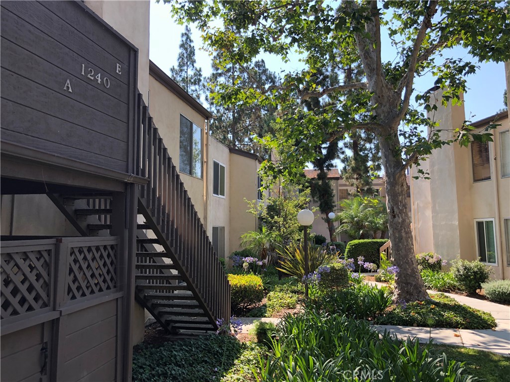 Spacious 2-bedroom, 2-bathroom condo located in a picturesque neighborhood. Enjoy expansive common areas, a pool, spa, and peaceful streams flowing through the property. The generous family room features a cozy fireplace, and the dining room flows seamlessly into a updated kitchen with updated cabinets and appliances. A roomy balcony overlooks lush, mature trees, adding to the serene atmosphere.