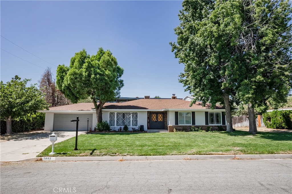 Welcome to this charming single-level home in one of Rialto’s most desirable and established neighborhoods. Built in the 1970s, this residence features 3 spacious bedrooms and 2 bathrooms with a bright, open floor plan that flows seamlessly for comfortable everyday living. The home is equipped with solar panels, offering energy efficiency and cost savings. Step outside to a large backyard with endless possibilities—perfect for entertaining, gardening, or creating your dream outdoor retreat. Set in a quiet, established community, this home is a rare find in Rialto. You’ll enjoy easy access to the 210 freeway and be just minutes from shopping, schools, and popular restaurants.