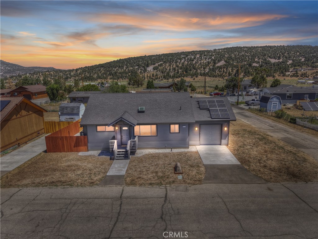 Brand new build, finalized in 2025 ~ Be the first to start the story of this home that will shape lives for generations ~ Located on a corner lot with a one car garage and paid for solar panels ~ Plenty of room to park you boat, RV, toys, family and friends! Inside you will love the open floor plan with engineered hardwood flooring running throughout and gas fireplace ~ The bedrooms are carpeted for added comfort ~ Natural edged granite countertops are featured in the kitchen and both bathrooms ~ Thinking ahead, the builder has already pre-wired for an EV charger and home security system ~ Not only are you getting a brand new house for under $400k, you get wonderful views of Sugarloaf mountain and the ski slopes ~ This is an opportunity you will not want to miss!