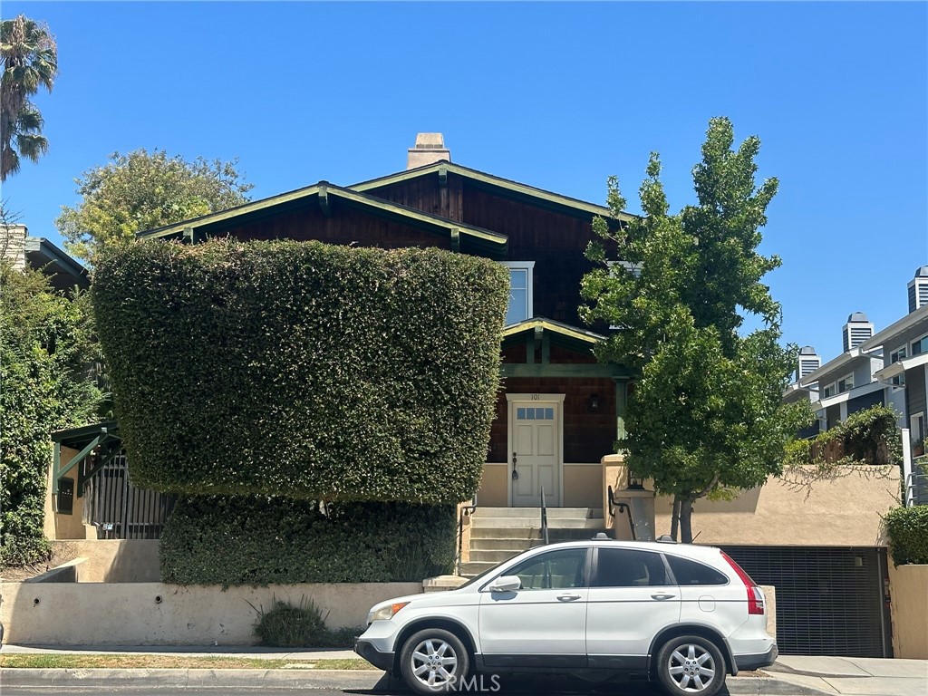 Welcome to this beautiful front unit craftsman style townhouse in a 4 unit gated community. Updated kitchen with newer appliances. Spacious step down living room with fireplace and built-in book shelves. 2 suites upstairs with a fireplace in the master suite. Central air. Bright and airy with skylight upstairs. Private patio. Two car attached garage in gated area. Laundry in garage. Prime Pasadena location close to freeway, gold line, shopping and restaurants.