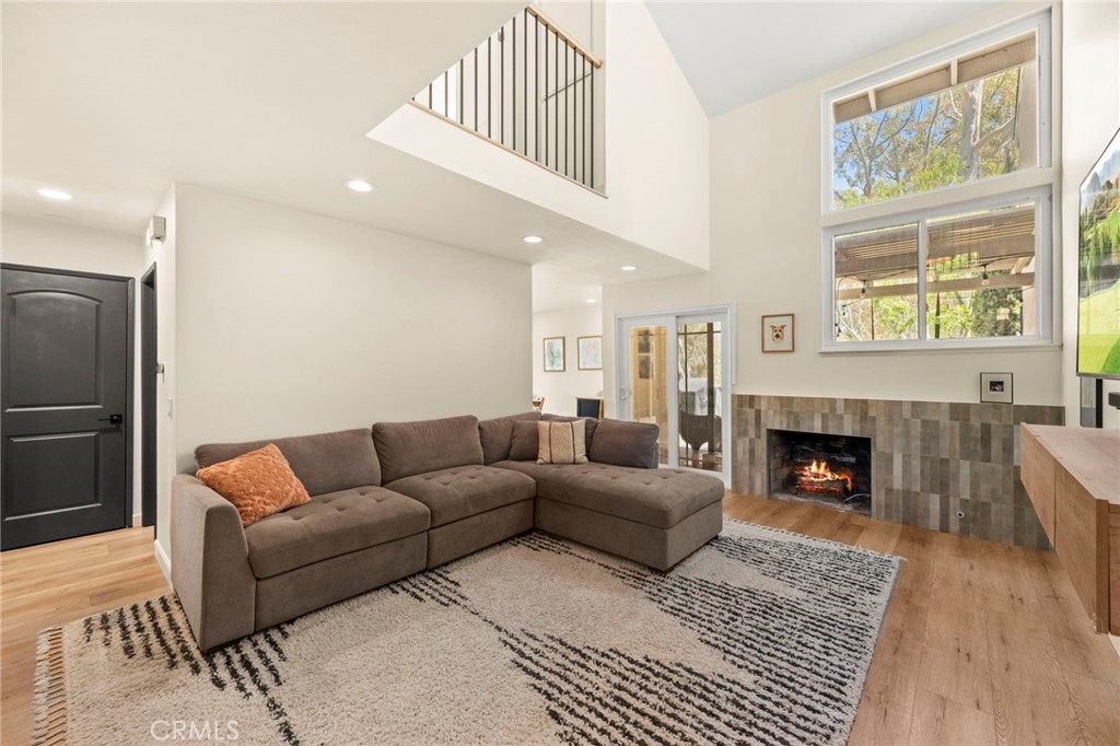 Step inside this stunningly updated townhome where modern style meets comfort & functionality. Featuring custom white oak stair railings and designer touches throughout, this home is truly move-in ready. The gorgeous new fireplace tile & fresh kitchen backsplash bring a refined look to your main living area, while the LVP flooring (installed 2023) adds durability and elegance. A convenient main floor bedroom provides a versatile space for guests, a home office, or a quiet retreat. Enjoy the views from every window in the house! This is a coveted end unit with a serene backdrop, opening directly to lush trees and natural surroundings. The community connects directly to Oak Canyon Nature Center where you'll enjoy easy access to scenic hiking & biking trails.
Recent updates provide peace of mind, including a new water heater (2023), re-leveled upstairs floor (2024), and a brand new roof (2025) with a 40 year warranty. This is the perfect blend of quality upgrades, thoughtful details, and an unbeatable location!