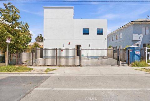 Photo of 1009 E 29th Street, Los Angeles, CA 90011 (MLS # SB26084832)