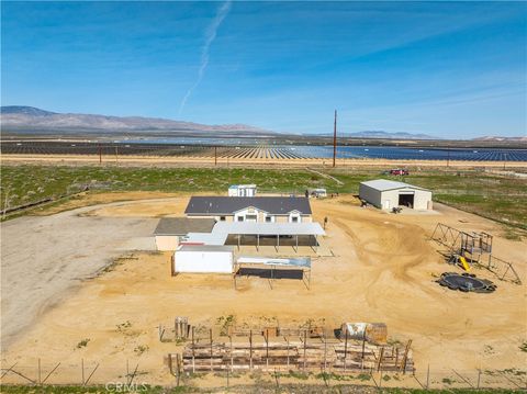 Photo of 12567 Sahara Ave, Rosamond, CA 93560 (MLS # SR26024192)