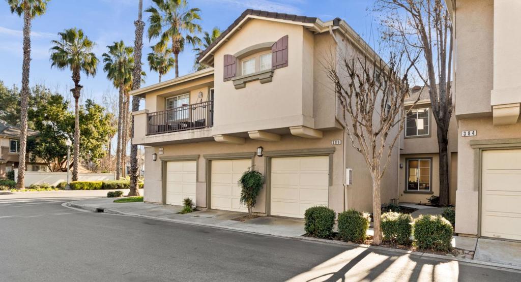 Welcome to this charming home in The Greens at Palmia! This residence features two spacious bedrooms and 2.5 baths. The interior has been freshly painted, new plush carpet and a newly updated hall bathroom. The primary suite has a walk-in closet, double sinks, and a nice-sized tub with a shower. The kitchen has a gas oven/range, perfect for cooking enthusiasts, a new dishwasher, garbage disposal, and hookups for an ice maker. You also get a Separate laundry room. Enjoy central AC for those coming hot summer months. One car attached garage and additional one car assigned parking. Close to shopping, Hwy 85/101, light-rail, and Kaiser hospital. The fantastic location, along with a nice community pool and low HOA dues, make this a great place to call home.