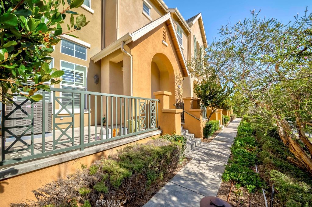 Welcome to the beautiful and well maintained townhome located in the high sought after Amerige Heights/Radcliffe Community. Built in 2006. Features a Multi-level floor plan with 2 master bedrooms, 2.5 bath, 1623sf, high ceiling, 2-car attached garage with extra storage space. Front door entrance to main floor Living room with high ceiling, a cozy fire place, recessed lights and direct garage access. The kitchen, dining area, and family room has it's own floor separate from the living room. Kitchen with a kitchen island /breakfast counter, recessed lights, matching white kitchen cabinets, counter depth refrigerator, dishwasher and counter top. Kitchen is open to family room and dining area. Big double-pane windows provide lots of natural light. All bedrooms are on the top floor. Spacious Master bedroom suite includes a walk-in closet with mirrored doors, master bathroom with separate soak tub and walk-in shower, and dual sinks. 2nd bedroom has it's own bathroom with a bathtub and shower and a large closet. Laundry room is conveniently located in the upper level. Beautiful wood floor in living room, kitchen, family room, dining room and all bedrooms. White tile floor in all bathrooms. 2 car garage has extra storage space. HOA amenities include, pools, spa, parks, Dog park, playground, tennis courts, clubhouse, BBQ, picnic area and new 10GB fiber optic internet service to every home at no extra cost. Amerige Heights Shopping is a 5 minute walk and it has most of what you need - banks, restaurants, gym, mail services, supermarket, convenient store, gas station, and more. Excellent schools - Robert Fisher Elem, Robert Fisher Middle and Sunny Hills High. .