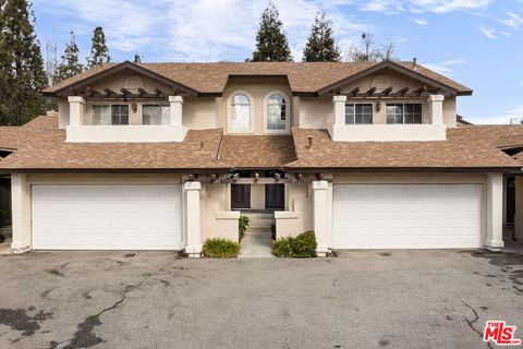 Photo of 22911 Banyan Place #242, Santa Clarita, CA 91390 (MLS # 26654039)