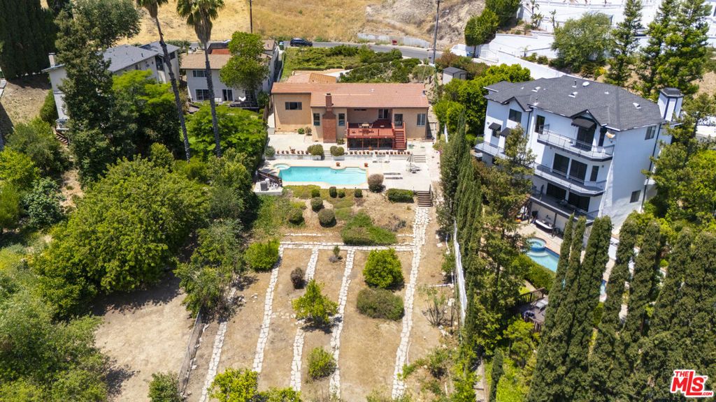 Photo of 4996 Llano Drive, Woodland Hills, CA 91364 (MLS # 25543075)