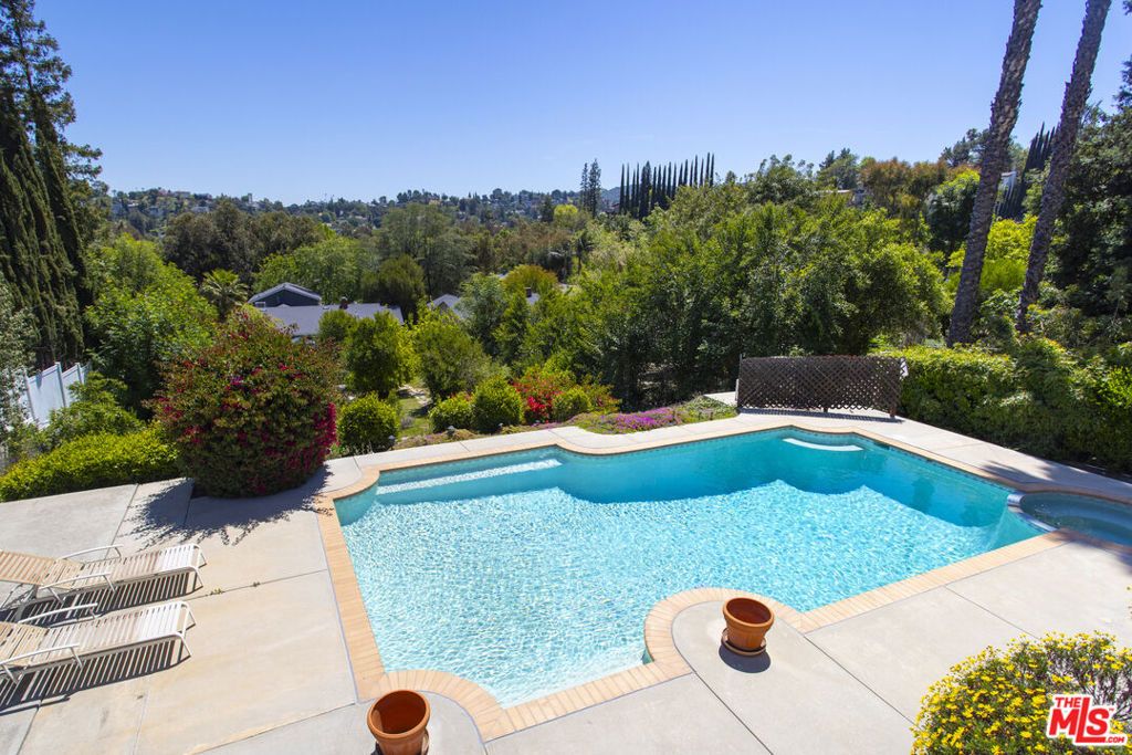 Photo of 4996 Llano Drive, Woodland Hills, CA 91364 (MLS # 25543075)