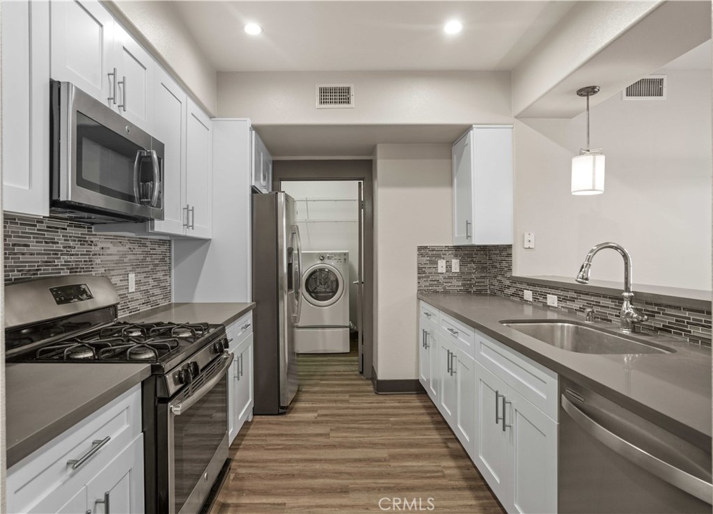 This beautifully maintained 2-bedroom, 2-bathroom condo combines comfort, convenience, and modern living. Step into a spacious open-concept living area that maximizes natural light, creating a welcoming atmosphere for both relaxation and entertaining. The recently remodeled kitchen features contemporary appliances, ample cabinetry, and sleek countertops. The bedrooms provide peaceful retreats with large closets and easy access to the bathrooms, which boast modern finishes for both functionality and elegance. Enjoy your morning coffee or unwind in the evening on your private balcony, perfect for soaking up the beautiful Southern California weather. The community resort-style amenities enhance your living experience with a pool for leisurely swims and an outdoor BBQ for your grilling needs. Stay active and healthy in the well-equipped fitness center, host gatherings in the comfortable community clubhouse, or sit back relax and enjoy the latest films in the community movie theatre. Location is everything, and this condo is perfectly situated with multiple shopping centers within walking distance, offering a variety of dining, retail, and entertainment options. Nearby parks and green spaces provide excellent opportunities for outdoor activities and relaxation. Don’t miss the chance to make this exceptional condo your new home. Schedule a tour today and discover all that this vibrant Valencia community has to offer!