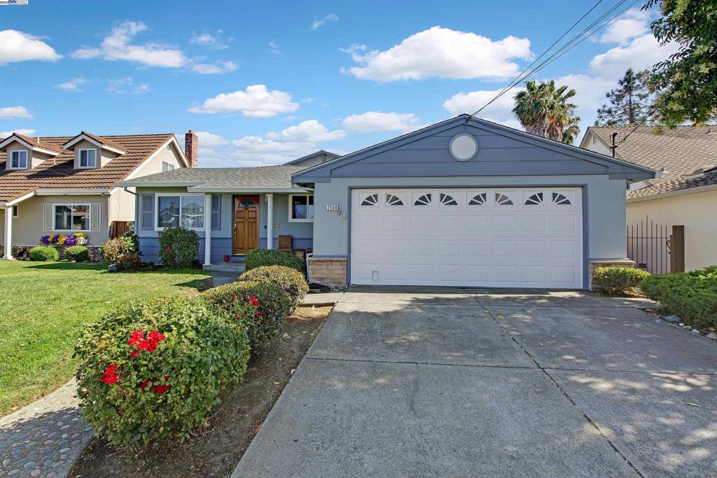 An amazing home with no rear neighbors! Lots of windows for natural light all day. Recently and tastefully updated including all new lighting, texture, interior and exterior painting. New baseboards, refinished hardwoods, new luxury vinyl tile and new carpet in the upper level en-suite. Kitchen has wood cabinetry, granite counters, stainless steel appliances including a new oven & microwave, 2 lazy Susan's, slide out drawers. Huge permitted bonus room features a built in bar and wood burning stove, built in benches with storage underneath and a sliding glass door to the rear yard...perfect for Friday night football or game nights. A permitted updated, spacious and modern upper level en-suite offers total privacy and tons of room for a siting area and desk too! Large updated bath split bath, new mirrors and lighting. Big walk-in closet and a closet nook. Separate family room with brick fireplace and slider to back yard. Ideal for extended or multi-generational families. Just across the bridge. More house, less money! Come see what over 2500 square feet of open concept might look like for your family! Ideal location for commuters, close to Chabot, shopping and so much more. Open Sunday 8-10 2 to 4PM