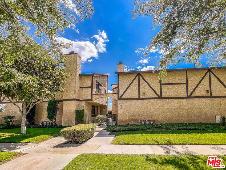 MOTIVATED SELLER! Move-In Ready! LOW HOA DUES: ($315 a month) Includes Water, Trash Pool and Landscape Maintenance. Minutes way from the freeway! Live in it or rent it out for about $2,500 a month. Close to Antelope Valley Medical Center - Spacious 2-bedroom, 2.5-bathroom townhome offers a perfect comfort. The floor plan maximizes space and natural light, creating a welcoming atmosphere throughout the home. Master Suite: The generous master suite includes an en-suite bathroom and ample closet space, providing a private retreat at the end of the day. Additional Bedroom: The second bedroom offers flexibility for guests, a home office, or a cozy den. Outdoor Patio: Enjoy outdoor living on your private patio, perfect for relaxation and outdoor dining. Convenience: A dedicated laundry area, storage space, and a 2-car covered garage ensure convenience and functionality. Location: This townhome is ideally situated in a peaceful neighborhood, with easy access to shopping, dining, parks, and major transportation routes. Don't miss the opportunity to make this townhome your new residence. Schedule a viewing today to experience the comfort and convenience of modern living. For inquiries and appointments, please contact me.