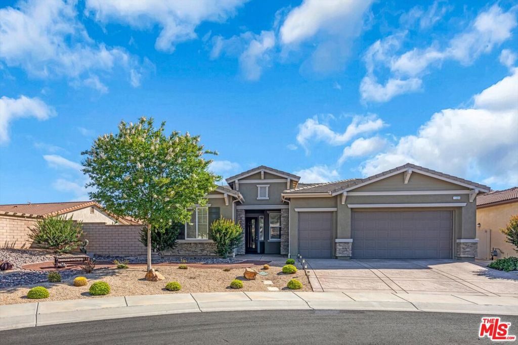 Welcome to One of Four Seasons 55+ Gated Community's FINEST HOMES. This Exceptional MONTAGE MODEL, tucked into a quiet, expansive cul-de-sac, offers Stunning Exterior Curb-Appeal and thoughtful Upgrades from the inside out. This GRAND BEAUTY includes Custom Paint, Classic Brick Overlays, and a Stamped Concrete Driveway. The front Landscape is Meticulously designed with Beautifully Crafted Low Maintenance Drought Tolerant Plants, Decorative River Rocks and a Gravel Pathway that leads to a serene area by the trees. Greeted by a Custom Leaded Glass Door, step inside this Gorgeous 2412 Sq Ft, Two Bedrooms, Three Bath + Den/Office home where every detail Exudes Elegance and Craftsmanship. The Oversized Kitchen is a Chef's Dream with Custom Two-Toned Cabinetry, Stunning Oversized Quartz Countertops, Gorgeous Octagon Tile Backsplash, Built-in Appliances and an Updated Refrigerator. A Custom Cabinet alcove with Mirrored Backing and Glass Shelves provides a touch of artistry and extra storage. There are Beautiful Wood Floors throughout most of the home. Other features include Crown Molding, Recessed Lighting, Plantation Shutters, an Alarm System, and Updated Ceiling Fans and Light Fixtures. The Den/Office has a Custom-Built-in Wall Unit for books or memorabilia, and a Custom Built-in Queen-Size Murphy Bed for extra overnight guests. The Quaint Living Room provides plenty of windows, and a Gas Fireplace. The Formal Dining Room is spacious and has a Lovely Chandelier that is perfect for Holiday Gatherings. The Extensive Master Bedroom has timeless charm with Bay Windows, Plantation Shutters, Roman Shades and the Attractive Sliding Barn Door that leads to an 'EN SUITE' with an Oversized Custom Tiled Shower, Dual Sinks, and a Large Walk-in Closet. The Second Bedroom is a generous size with a Walk-in Closet that is situated next to the Full-Sized Guest Bathroom for convenience. Additional highlights of this exceptional home include a Half Guest Bathroom with Plenty of Cabinets and Open Shelving, a Large Laundry Room with Updated Washer & Dryer, a laundry sink with Upper and Lower Cabinetry. The Garage has Epoxy Flooring, Parking for Two Cars, a Golf Cart and plenty of storage. Unwind in your expansive backyard oasis under the extended Covered Patio, complete with a ceiling fan to keep you cool on warm summer nights. More Stone Pathways and beautifully Stamped Concrete lead to the soothing sound of a gently bubbling Potted Fountain, or warm-up by the Gas Fire Pit. Whether you're admiring the view of the mountains, reading a good book, grilling on the BBQ, or picking the fresh Oranges, Lemons, and Kumquats this space is the perfect retreat. This home has luxury, charm, and comfort; ready for you to live your Best Life. The FOUR SEASONS Picturesque Gated, Community is surrounded by Scenic Mountains and offers tons of clubs, groups and activities. There are three Clubhouses, a Bistro, Billiards, Movie Theater, Fitness Centers, Pools, Spas, a Salon, Library, Outdoor BBQ Areas and several Hiking Trails.