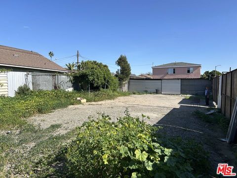 Photo of 1403 E 42nd Street, Los Angeles, CA 90011 (MLS # 26643933)