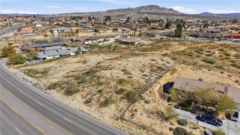 Photo of 16423 Village Drive, Victorville, CA 92394 (MLS # HD26048166)