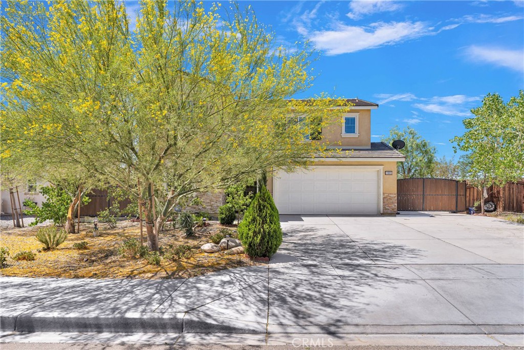 Spacious 4 bed, 3 bath home in Adelanto built in 2015. Features an open floor plan, downstairs bedroom and full bath, upstairs loft, and a large primary suite. Enjoy nearly 2,000 sq ft of living space, central AC/heat, a two-car garage, and a covered porch/patio. The backyard includes partial cement—perfect for entertaining. Situated on an 8,300+ sq ft lot near schools, shopping, and commuter routes. Move-in ready!
