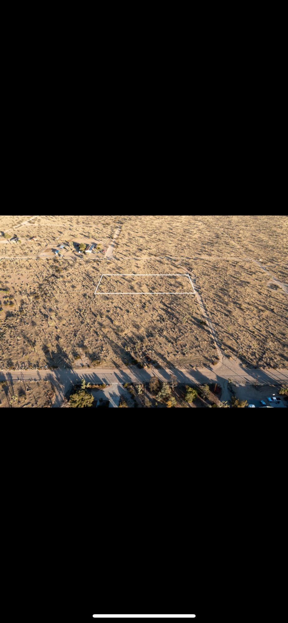 Property is located in a desirable residential neighborhood, with very few neighbors close by. Enjoy the beauty of Yucca Valleys natural desert landscape. Watch the sun set turn into night sky filled with bright stars. 10 minute drive to town for all your necessities. 20 minute drive to Joshua Tree national park or Pioneer town with a stop at Pappy and Harriets for a live music show. Historic Palm Springs is 45 minutes away, Big Bear is an hour and fifteen minutes. Disneyland and coastal cities are approximately a two hour drive.Yucca valley has an old town vibe with quaint shops to explore. You might even get a little snow during the winter. Great Hiking and off road trails in Joshua Tree National Park. Build the home of your dreams or create a tourist's oasis, the ideas are endless!