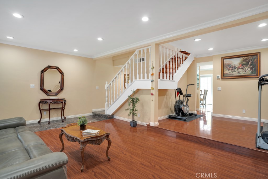 Welcome to the highly desirable gated community of ‘Tarzana Oaks'. This wonderful light & bright 3 Bedrooms and 3 Baths 1,673 square feet townhouse feels as a single family home with its 2 car attached garage, and private patio. Tastefully updated, featuring wood-like floor and marble downstairs and wood-like floor upstairs, recessed lighting throughout, and dual pane windows. As you enter the home you will be greeted by the spacious living room with a gas fireplace, and large windows bringing in lots of natural light through the wood plantation shutters, a formal dining room, a wet bar, a powder room, and an amazing chef kitchen with white cabinets, granite counters ,and a convenient breakfast counter bar. Upstairs are the 3 bedrooms. Two good size bedrooms share a full bath, and a large master bedroom with high vaulted ceiling, a convenient walk-in closet, and an en-suite master bath. The private patio is great for entertaining & having fun summer barbecues, with upgraded floor of Idaho flagstones.
The garage is conveniently attached to the unit, it has overhead storage space. One of the better locations within the complex away from the main street in a private area. HOA includes basic cable TV, a discounted rate of internet service, water, trash, sewer, earthquake insurance.
The gated community offers a sparkling pool with seating area under a large gazebo, surrounded by resort style trees with pool furniture, a gated kids playground, and guest parking. Walking distance to parks, restaurants, shops, places of worship, easy freeway access, and the orange bus line station. This is an amazing opportunity, and a must see home, Make it yours Today!