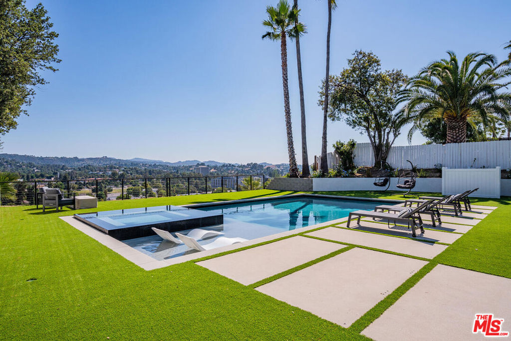 FULLY FURNISHED & EQUIPPED, AVAILABLE FOR SHORT-TERM RENTAL. Situated in the hills of Carlton Terrace and completely remodeled with state of the art finishes this 4 bedroom 2.5 Bath Single level home offers the most incredible breathtaking views along with a gated sparkling pool and spa, mini golf putting green, built in BBQ and an expansive covered patio for outdoor dinning to complete a fully functional entertainers back yard. Modern and fully equipped kitchen with center island opens to dinning room and living room for convenient access. Wood-floors throughout and stylish paneling accompanies the flawless design throughout this incredible property. Easy access to shopping and entertainment.