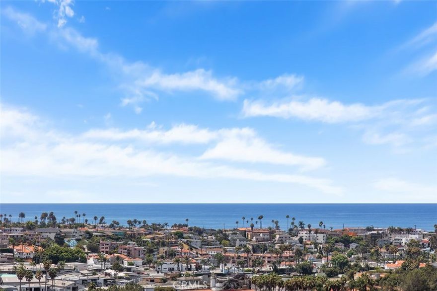 Welcome to your dream, coastal retreat in the ever popular city of San Clemente. Nestled up high, in the Faire Harbour complex, and angled to the South, this residence features outstanding, amazing, panoramic, forever ocean views that stretch from San Clemente and Dana Point to Catalina Island and city lights, as well. Thoughtfully remodeled with new custom soft close cabinets, appliances and fresh neutral colors. The Master bedroom features ocean views while the secondary bedroom has a garden window seat. The private balcony is perfect for morning coffee and breathtaking afternoon sunsets. Gentle breezes and ocean views create pure relaxation. Residents can enjoy the nearby community pool, spa and sport court. The two car garage is conveniently located near the home. This unit has a short flight of stairs leading to the front door and living is on one level. Elementary, Middle and High School are minutes away.  Downtown San Clemente is known for local theatre, excellent restaurants, boutique shops and open air Farmers Markets. The area definitely speaks to a small town vibe. Known as the Spanish Village By The Sea, the area's heritage and architect are displayed everywhere. Its rich history promotes a healthy outdoor lifestyle, popular beaches and family friendly environment. The Beach Trail for hiking and biking offers stunning views and park areas. The City is commuter friendly with train lines, Metro and Amtrak, servicing from Los Angeles to San Diego. The year round climate and unlimited sunshine make for a truly treasured place to live. Up the Coast, is Dana Point, offering world class resorts, a newly renovated Dana Point Harbor complete with boat slips, yacht clubs, fishing, and Catalina Express. HOA dues include water. Street parking is available with a permit. Remodeled bathroom has double vanities for each bedroom and main bath features a skylight. New HVAC. There is currently an additional assessment for $46.23 per month for the upgraded Faire Harbour Community Re-Piping. Balance of assessment to paid at close of escrow by Seller. Seller, seller's agent and broker have not verified information in this MLS listing and have relied on public sources of data. Buyer and buyer's agent are strongly advised to perform their independent inspections and verify all information, including square footage, lot size, and property features to their satisfaction.