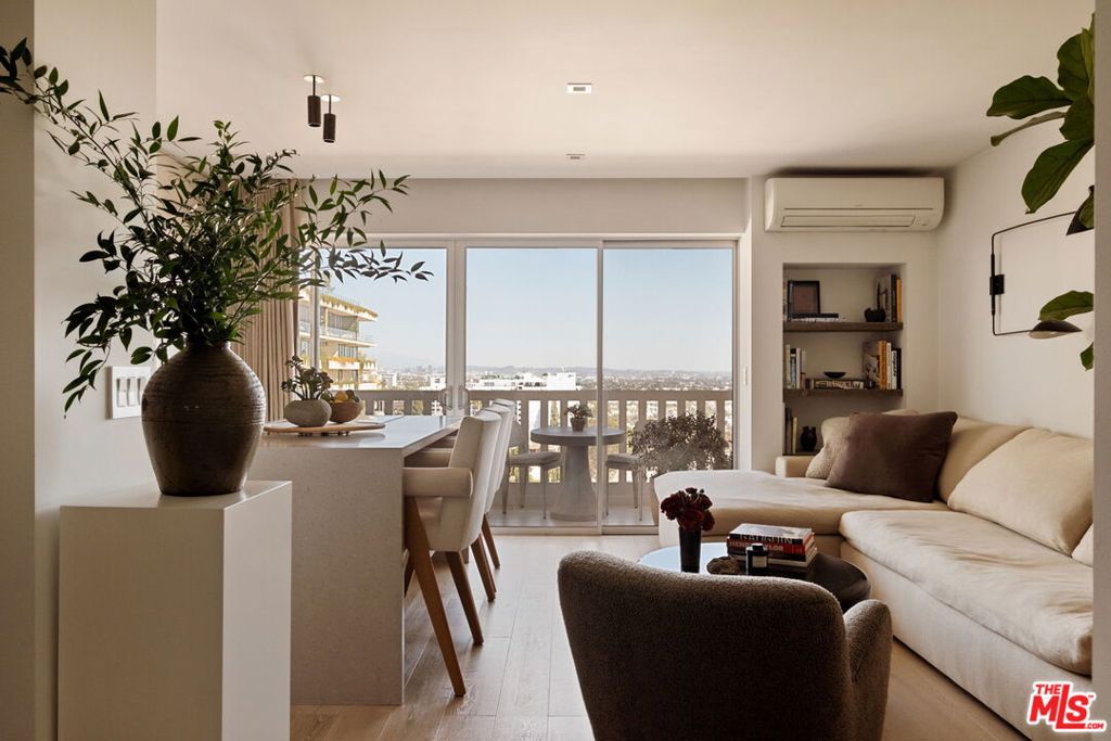 Stunning designer-done 8th floor unit with breathtaking east-facing city views, located in the prestigious, full-service Doheny West Towers. Reimagined in 2018, this unit was thoughtfully designed with high-end, custom finishes and fixtures throughout, and beautiful French White Oak floors. A cleverly added divider wall creates a cozy 'bedroom' nook, offering a sense of separation while maintaining the studio's bright and airy feel. Abundant custom storage and cabinetry throughout, plus a spacious walk-in closet which leads you to the stunning bathroom tiled in natural stone. The building, renovated in 2024, provides state-of-the-art amenities including a heated saltwater pool, spa, gym, and sauna, all for year-round enjoyment. As a full-service building, residents benefit from 24-hour concierge/doorman service, and complimentary valet parking for guests. Ideally situated in the heart of West Hollywood, close to Beverly Hills, and just a stone's throw away from the Sunset Strip, Soho House, The Edition, and all the best of West Hollywood.
