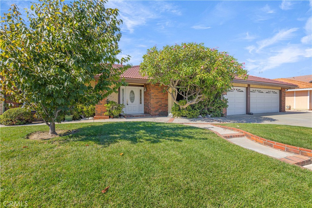 Beautifully Remodeled Home in Prestigious Award Estates – Fountain Valley
Welcome to this stunning, move-in ready home located in the highly desirable Award Estates community in the heart of Fountain Valley. Boasting nearly 2,900 sq ft of living space, this spacious residence features 4 generously sized bedrooms, soaring pitched and beamed ceilings, and an abundance of natural light streaming through upgraded vinyl windows.Enjoy the warmth and character of two fireplaces—one in the formal living room and another in the expansive family room, which seamlessly connects to the beautifully remodeled open-concept kitchen. The kitchen is equipped with sleek stainless steel appliances, offering both style and functionality for the home chef. Situated on a large lot, the backyard offers a peaceful retreat with mature fruit trees and ample space for outdoor entertaining, gardening, or relaxing with family and friends.With tasteful, modern updates throughout and located in a prestigious neighborhood known for its pride of ownership, this home combines comfort, elegance, and an unbeatable location. Don’t miss this rare opportunity to own a truly exceptional property in Award Estates!