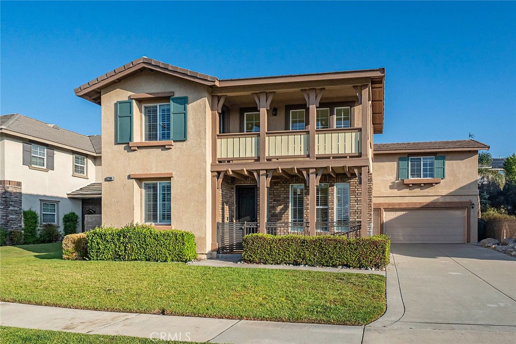 Welcome to this stunningly upgraded residence in one of Rancho Cucamonga’s most sought-after neighborhoods, known for its top-rated schools, beautiful surroundings, and vibrant community. With a captivating blend of brick and stucco exteriors, a graceful balcony, and an extended driveway, this home exudes timeless curb appeal and modern sophistication. Step inside to discover a bright and inviting interior, where a tiled entry flows into the heart of the home—an open-concept kitchen and family room designed for comfort and connection. Rich dark laminate floors add warmth and character throughout the main level. A versatile bonus room offers flexibility as a home office, guest suite, or creative studio, while the formal dining room provides the perfect setting for memorable gatherings. The chef’s kitchen impresses with a large center island, gleaming granite countertops, natural wood cabinetry, double ovens, a 5-burner cooktop, and abundant workspace, seamlessly connecting to the cozy family room complete with a welcoming fireplace. Upstairs, an expansive loft offers endless possibilities for entertainment, study, or relaxation. Three spacious bedrooms include one with private balcony access, and the luxurious primary suite is a true retreat—bathed in natural light and featuring a spa-inspired bathroom with dual vanities, soaking tub, separate walk-in shower, and an oversized walk-in closet. The backyard has been beautifully reimagined with a redesigned slope and an extended flat area—perfect for outdoor dining, play, or quiet evenings under the stars. Surrounding the space is a lush collection of mature fruit trees, including persimmon, orange, apple, pomegranate, plum, apricot, loquat, Asian pear, peach, lemon, lime, mandarin, longan, grapes, and goji berry—creating your own private orchard sanctuary. With thoughtful upgrades, elegant living spaces, and a prime location near parks, shopping, and award-winning schools, this home perfectly blends beauty, comfort, and convenience. Welcome to the lifestyle you’ve been dreaming of.