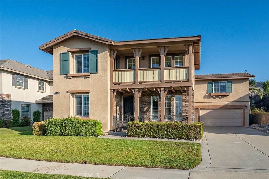 Welcome to this stunningly upgraded residence in one of Rancho Cucamonga’s most sought-after neighborhoods, known for its top-rated schools, beautiful surroundings, and vibrant community. With a captivating blend of brick and stucco exteriors, a graceful balcony, and an extended driveway, this home exudes timeless curb appeal and modern sophistication. Step inside to discover a bright and inviting interior, where a tiled entry flows into the heart of the home—an open-concept kitchen and family room designed for comfort and connection. Rich dark laminate floors add warmth and character throughout the main level. A versatile bonus room offers flexibility as a home office, guest suite, or creative studio, while the formal dining room provides the perfect setting for memorable gatherings. The chef’s kitchen impresses with a large center island, gleaming granite countertops, natural wood cabinetry, double ovens, a 5-burner cooktop, and abundant workspace, seamlessly connecting to the cozy family room complete with a welcoming fireplace. Upstairs, an expansive loft offers endless possibilities for entertainment, study, or relaxation. Three spacious bedrooms include one with private balcony access, and the luxurious primary suite is a true retreat—bathed in natural light and featuring a spa-inspired bathroom with dual vanities, soaking tub, separate walk-in shower, and an oversized walk-in closet. The backyard has been beautifully reimagined with a redesigned slope and an extended flat area—perfect for outdoor dining, play, or quiet evenings under the stars. Surrounding the space is a lush collection of mature fruit trees, including persimmon, orange, apple, pomegranate, plum, apricot, loquat, Asian pear, peach, lemon, lime, mandarin, longan, grapes, and goji berry—creating your own private orchard sanctuary. With thoughtful upgrades, elegant living spaces, and a prime location near parks, shopping, and award-winning schools, this home perfectly blends beauty, comfort, and convenience. Welcome to the lifestyle you’ve been dreaming of.