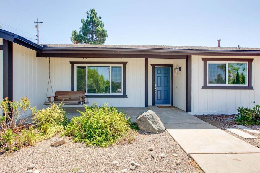 From the moment you arrive, the long driveway and expansive yard set the tone for the relaxed lifestyle this home offers. The interior delivers a modern kitchen, 4 generous bedrooms and 2 well-appointed baths, giving plenty of flexibility—whether you’re hosting guests, setting up a home office, or growing your household.  Recent renovations include solid flooring throughout, newer dual pane windows and sliding doors, HVAC, lawn, irrigation, and more.  The open living spaces allow for modern flow and entertaining, and with a half-acre lot, there’s ample potential for outdoor enhancements: RV or boat parking, ADU, workshop, garden, play area, or perhaps a pool. The desirable location in Vista delivers both suburban calm and city-link convenience.  Nearby is the rail trail, shopping, and convenient access to all of North County!