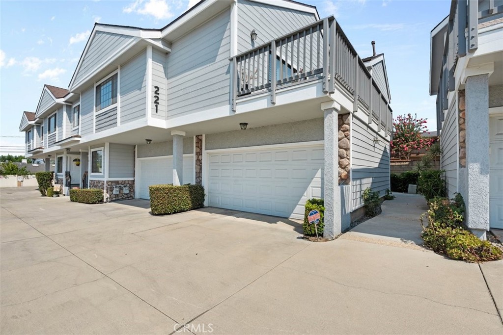 This townhome is located in the charming, historic foothill city of Monrovia, and welcomes you with a mudroom leading upstairs to a spacious living room with a cozy fireplace connected to the dining area. The updated kitchen features granite countertops and a built-in double oven, complemented by two good-sized bedrooms with high ceilings and two bathrooms. Additionally, the residence features a huge balcony right outside the living room and a downstairs two-car garage with a dedicated laundry area. Recent updates include newer roofing, newly painted walls. Just minutes away from great school districts, shopping centers, and hiking trails!. Central air conditioning but also a 2 ton mini split.