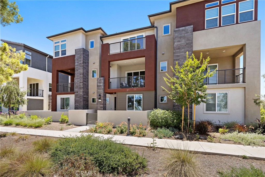 Unobstructed Park Views | Facing Clubhouse | Rare Front Tree | 3-Bedroom, 3.5-Bath Beauty in Solis Park
Welcome to 127 Biome, a rare gem in the Great Park community, ideally situated directly facing the lush community park and the clubhouse with resort-style pool and jacuzzi, with no neighbors in front, offering unobstructed views and exceptional privacy. Even more unique—a mature tree stands directly in front of the home, providing natural shade and a serene ambiance, a rare feature in the newer sections of Great Park.
This beautifully designed home offers approximately 2,031 sqft of living space with 3 spacious bedrooms and 3.5 bathrooms, each bedroom featuring its own private en-suite for maximum comfort and privacy.
The first floor includes a welcoming private bedroom suite, ideal for guests, a home office, or multi-generational living.
The second floor features an open-concept kitchen, dining, and living space, seamlessly connected to a sunlit balcony, perfect for relaxing or entertaining.
On the third floor, you’ll find two additional bedrooms, including the luxurious primary suite with an oversized private balcony showcasing stunning mountain views.
Enjoy the best of Solis Park living—green parks, scenic trails, bike paths, and resort-style amenities including multiple pools, spas, splash pads, sports courts, and soccer fields, all beautifully maintained.
Walking distance to Solis Park School (Pre-K to 8th grade) and Portola High School, and minutes from Woodbury Town Center, Irvine Spectrum, Whole Foods, Trader Joe’s, and Costco.
Easy access to I-5, I-405, 133, and 241 makes commuting effortless. Plus, you’re only 15–20 minutes to UCI, John Wayne Airport, South Coast Plaza, and the beach.