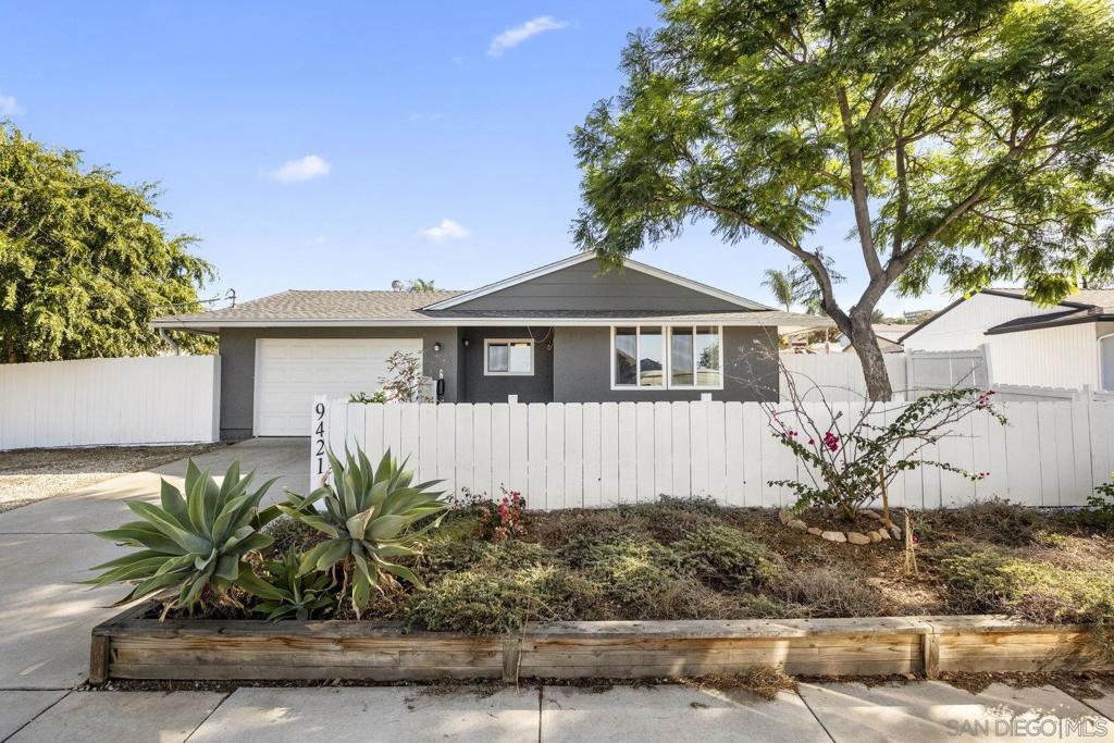 Discover Peace, Space & Possibility in Santee. Welcome to your sanctuary in the heart of Santee-a beautifully updated 4-bedroom, 2-bath home offering both tranquility and room to thrive. From the moment you arrive, you’ll be greeted by picturesque mountain views and a quiet, friendly street just 0.3 miles from Pride Elementary. Inside, enjoy modern comfort with a new roof, newer HVAC, sleek vinyl plank flooring throughout, and tastefully upgraded bathrooms and kitchen. The layout is ideal for entertaining, creating effortless flow between living, dining, family room, and outdoor spaces. Step outside into your private retreat, where mature fruit trees, colorful blooms, and a new fence create the perfect backdrop for relaxation-or your next big idea. With ample space for an RV, boat, pool, or even an ADU, the potential here is endless. Whether you’re gathering under the stars or sipping morning coffee in peace, this property offers room to breathe and space to dream-all just minutes from freeways, shopping, and the convenience of Santee living. Tranquility, upgrades, views, and endless potential-this is the home you’ve been waiting for.