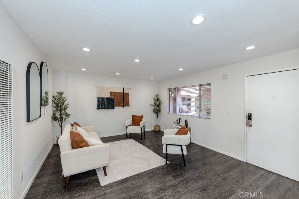 Photo of 6100 Rugby Avenue #108, Huntington Park, CA 90255 (MLS # OC25239717)