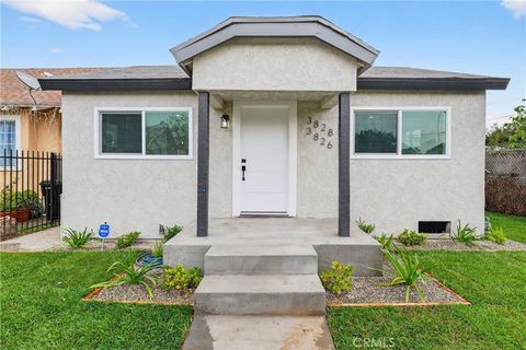 Photo of 3826 3828 La Salle Ave, Los Angeles, CA 90062 (MLS # DW25259877)