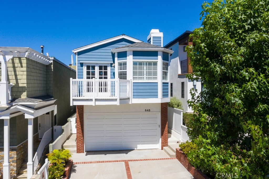 Coastal Charm Meets Everyday Magic on Longfellow:
Welcome to 645 Longfellow Ave—an effortlessly stylish, super-clean two-story home nestled just a few doors from the Greenbelt and a short, sandy-toed stroll to the beach. Set in one of Hermosa’s most coveted pockets (right on the Manhattan Beach border), this 4-bed, 2.5-bath gem clocks in at 2,159 sq ft of light-filled, lifestyle-loving space.
Let’s talk layout: the upper level is where the magic happens. Think wide open sightlines from kitchen to balcony, sunken living room with vaulted ceilings and brick fireplace, and French doors that swing open to a BBQ-ready deck with peek-a-boo ocean views and a salty breeze to match. A formal dining area sits perfectly between the living room and the kitchen—ideal for everything from pancake Sundays to wine-soaked dinner parties. Add in a guest-friendly powder bath and private top-level primary suite (with high ceilings, walk-in closet, soaking tub, walk-in shower, and dual vanity), and you’ve got the ultimate upstairs retreat.
Bonus: the entire home features beautiful vinyl flooring throughout—stylish, durable, and low-maintenance, making everyday life just a little bit easier (and better looking).
Downstairs? You’ll find three generously sized bedrooms (hello, storage!) and a full shared bath. The back bedroom opens directly to a private patio—perfect for an office, guest suite, or sun-drenched playroom. The patio itself is a dream: fully fenced with access to both the alley and front yard, it's got major potential for lounging, dining, or letting little ones or pups roam free.
Extras? You bet. We’re talking Maytag washer/dryer, water filtration and softening system with reverse osmosis tap, serviced alarm system, 2-car garage with storage, plus bonus driveway parking.
But let’s not forget what really sets this one apart: walkability to the beach, the pier, Valley Park, top-rated schools, and the best of both Hermosa and Manhattan Beach. It’s the kind of location people wait for—and rarely find.
Homes like this don’t last (especially not in this neighborhood), so don’t sleep on it. Schedule your tour and come see what coastal living should really feel like.