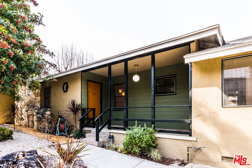 Centrally located in prime Glassell Park, this meticulously updated midcentury ranch style home is elevated up in the hills on a sprawling corner lot. 3 bedrooms, 1.5 baths, this home has been fully updated with stylish finishes. The third bedroom features a separate bonus room. The full bath features a Jacuzzi tub and glass-enclosed shower. Central air, original hardwood floors, and character details throughout. The kitchen is updated with a walk-in pantry, laundry, and all new appliances, including dishwasher. Impeccable indoor-outdoor flow, the living and dining spaces open up to a serene back patio perfect for entertaining. Freshly landscaped with a gated backyard. Large 2-car garage. Fireplace is decorative only. Close to Habitat, Target, local restaurants, and more, with easy access to local freeways. A great opportunity to live in a spacious, updated home in the heart of LA.