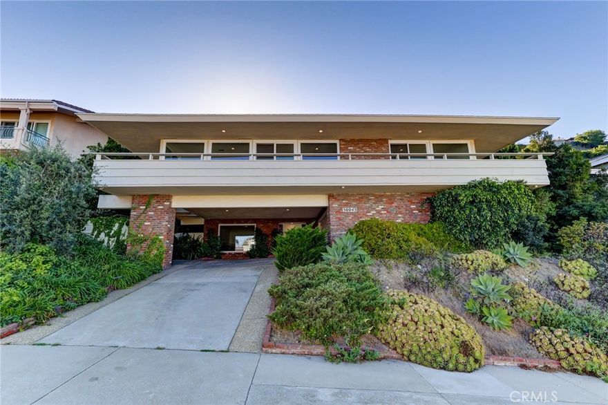 Mid-Century View Home in Miraleste Hills



High in the clouds of Rancho Palos Verdes sits 30043 Grandpoint Lane, a refurbished 4-bedroom, 3-bathroom mid-century home with approx. 2,400 sq. ft. of living space on a .35-acre lot. Located in the coveted Miraleste Hills neighborhood, near Miraleste Intermediate School, this property seamlessly blends classic design with modern updates and offers unforgettable views.



Expansive windows frame sweeping vistas of the city, harbor, and coastline, filling the open living spaces with natural light. The home features a private backyard with a sparkling pool, perfect for entertaining or enjoying the Palos Verdes lifestyle.



Inside, you’ll find four spacious bedrooms, three updated bathrooms, a dedicated laundry room, and ample storage throughout. A large two-car garage plus additional covered parking provides plenty of space.



With its prime hillside setting, mid-century character, and resort-style outdoor living, this rental is a rare opportunity to experience Rancho Palos Verdes at its best. Schedule a showing now.