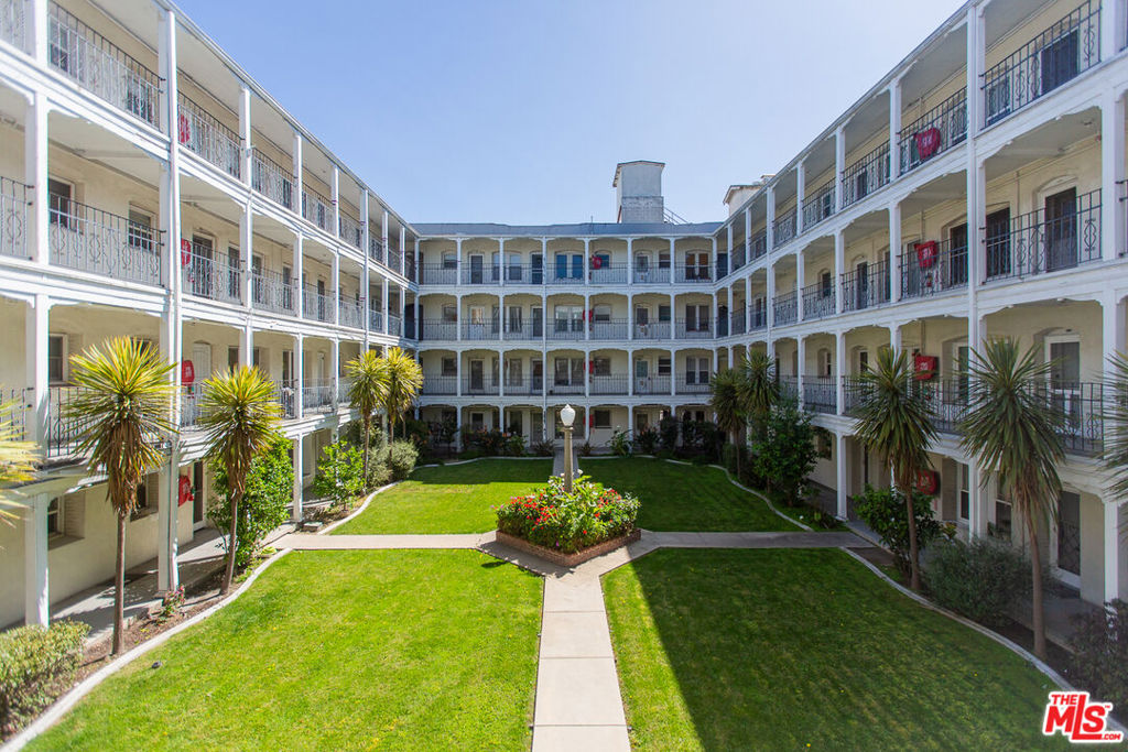 Step into the historic charm of Figueroa Arms with Unit #212, a 1-bedroom condo tucked away from the street in this iconic 1927 French Normandy and Tudor-style building. The architecture alone sets the tone with brick details, classic lines, and a sense of character that's hard to find these days. Inside, the unit is peaceful and quiet, offering a rare opportunity to own in a well-kept, centrally located complex.This home is move-in ready, with natural light filtering through large windows and all the vintage charm still intact. It comes with one assigned parking space and access to a beautifully landscaped community courtyard and picnic area, ideal for a morning coffee or an evening unwind. The location is unbeatable. You're just moments from USC, the museums at Exposition Park, and the electric energy of BMO Stadium, where LAFC and Angel City FC play under the lights. The Los Angeles Memorial Coliseum is just down the street which is an iconic venue gearing up to host events for the 2028 Summer Olympics, putting you at the heart of one of the most exciting global events to come. Whether it's game day, museum hopping, or a night out downtown, everything is within easy reach. Unit #212 is more than just a condo, it's a chance to live in a vibrant neighborhood steeped in history and on the cusp of even greater things to come.