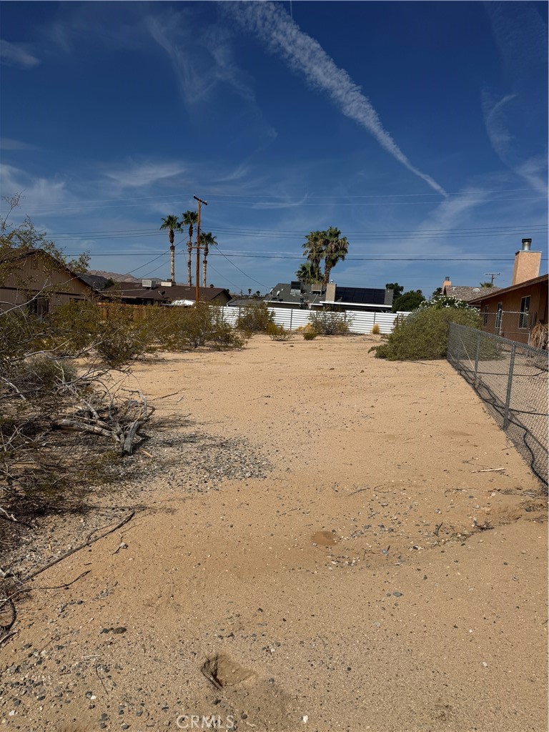 WATER METER ENTITLEMENT - VALUE SAVINGS FOR YOU IS $10,000 ++ Wholesale pricing for immediate sale. Lot faces East, and is the only remaining vacant lot on this street. Close to schools, grocery stores, city park. Enjoy nearby Joshua Tree National Park.