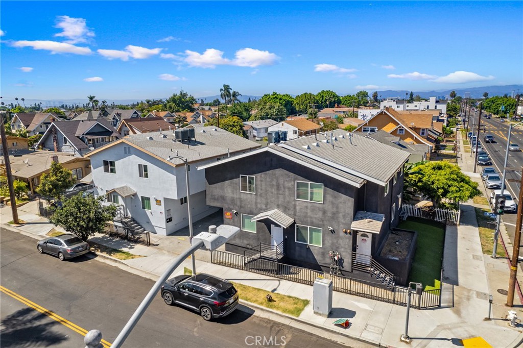 No Rent Control (per zimars site on 8/25/23). $201,600 proforma yearly gross income as estimated. 1031 exchange or buy and use as primary. The standout feature of this property is its premium corner location, situated conveniently close to USC and the Stadium. Comprising of two distinct buildings on the lot, it offers a total of four units. Two of these units are generously sized five-bedroom layouts, while the remaining two units consist of comfortable four-bedroom layouts.
At present, all four units are fully occupied, which makes this property a fantastic investment opportunity. Whether you're seeking a place to call home for yourself or aiming to capitalize on the real estate market, this property is well-suited for both scenarios.
The interior boasts sleek laminated flooring, ensuring a contemporary and low-maintenance aesthetic. Additionally, each unit comes equipped with air conditioning, guaranteeing year-round comfort. The inclusion of dual-pane windows not only enhances energy efficiency but also contributes to a quieter and more peaceful living environment. One of the property's exceptional attributes is its south-facing orientation, which floods the interior spaces with ample natural light. This abundant brightness creates an inviting and vibrant atmosphere, ensuring that each unit feels welcoming and refreshing. In summary, this property's prime corner location, proximity to USC and the Stadium, multiple units with varying bedroom configurations, current full occupancy, modern features like laminated flooring. AC included with dual-pane windows for energy efficiency, and the sunlit interior due to its south-facing aspect make it a remarkable opportunity for both homeowners and investors alike. Figure for net operating income is just Gross Yearly income Proforma figure without any expenses taken out.