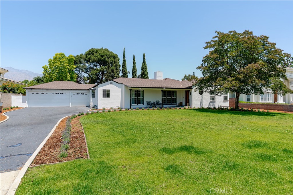 Discover comfort and style in this 2,804 sq ft one-story California ranch-style home, ideally located in Arcadia’s prestigious Baldwin Stocker neighborhood. Set on a rare 22,651 sq ft south-facing lot with 100 ft of frontage, this home offers privacy and potential for future development. The layout includes 3 bedrooms, 2.5 bathrooms, and a spacious 3-car garage with Tesla EV Charger. The expansive primary bedroom features two separate walk-in closets, offering ample storage and personal space. Enjoy recently updated, professionally landscaped, mature fruit trees, low-maintenance front and back yards with sprinklers and a built-in BBQ—perfect for outdoor living. Potential to add a detached ADU and an attached JADU, offering flexibility for extended family or rental income (buyer to verify with the City). Located just minutes from top schools, The Shops at Santa Anita, USC Arcadia Hospital, golf, dining, and more, this home blends classic charm with everyday convenience in one of Arcadia’s most desirable neighborhoods.