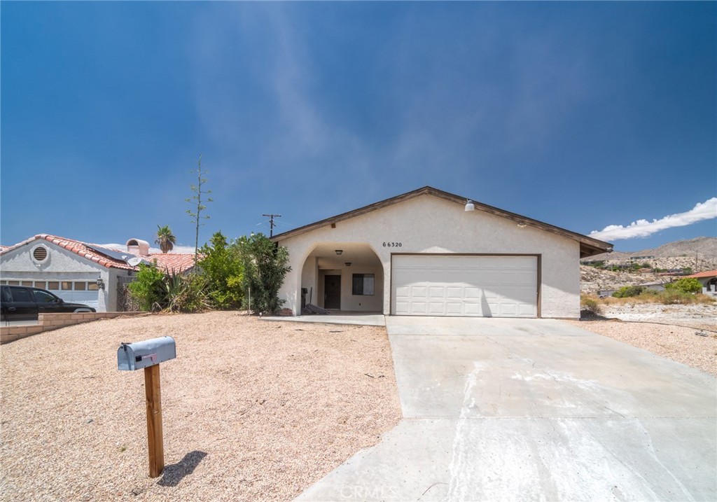 Discover this beautiful desert retreat located on Avenida Barona and Calle Fundador, offering stunning mountain views from both the backyard and living room. he spacious formal dining area, new window coverings, and pristine tile floors with cleaned grout make this home move-in ready. Enjoy the large desert backyard, perfect for outdoor entertaining, with a covered patio currently used as a fitness area—ideal for relaxation, family gatherings, and holiday barbecues. Situated centrally, this home provides quick access to local mineral spas, the nudist spa, shopping, dining, and schools. It’s just a few minutes’ drive to Palm Springs, 15 minutes to Yucca Valley, and approximately 30 minutes to Joshua Tree National Park. Additionally, the iconic Integratron in Landers is only 45 minutes away. Don’t miss the opportunity to make this exceptional home yours—schedule a visit today before it’s gone!